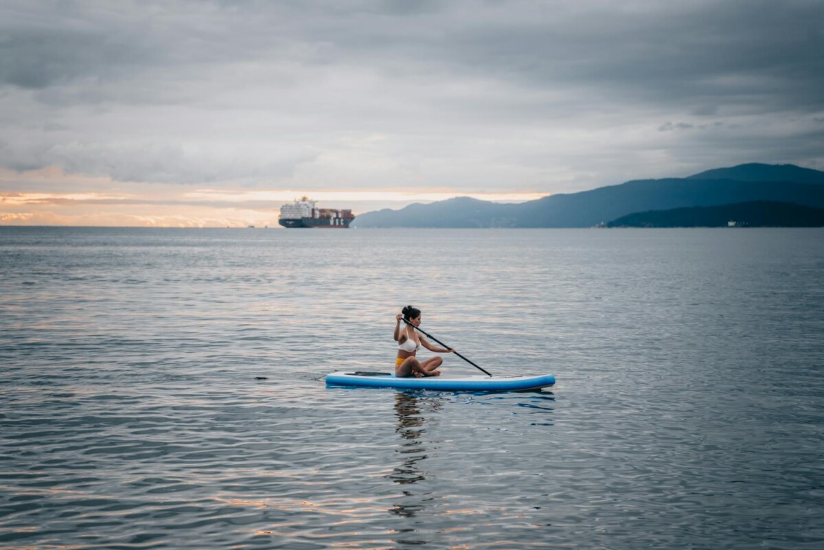 woman paddle boarding